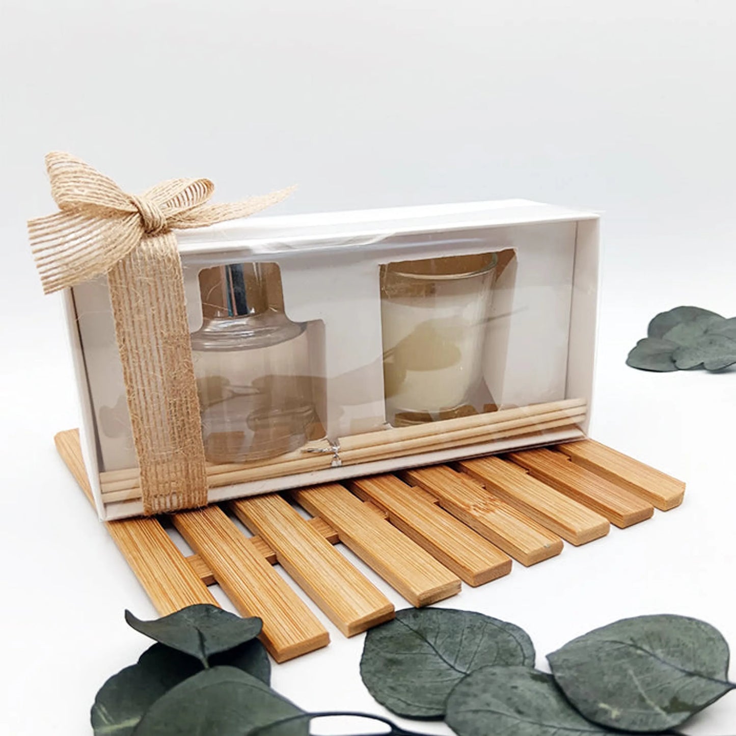 Pack de vela y mikado con lazo de yute, detalle original para invitados.