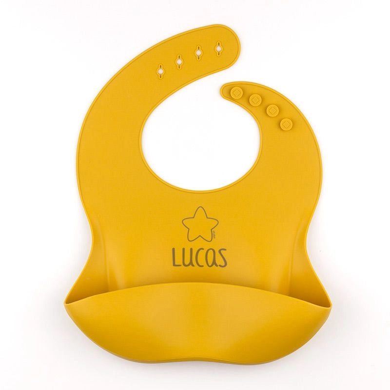 Babero flexible de silicona para bebé, personalizado con nombre y color favorito.