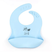 Babero infantil de silicona con nombre grabado y colores personalizables.