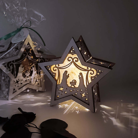 Lámpara de madera en forma de estrella con pesebre iluminado por luces LED, hecha y pintada a mano.