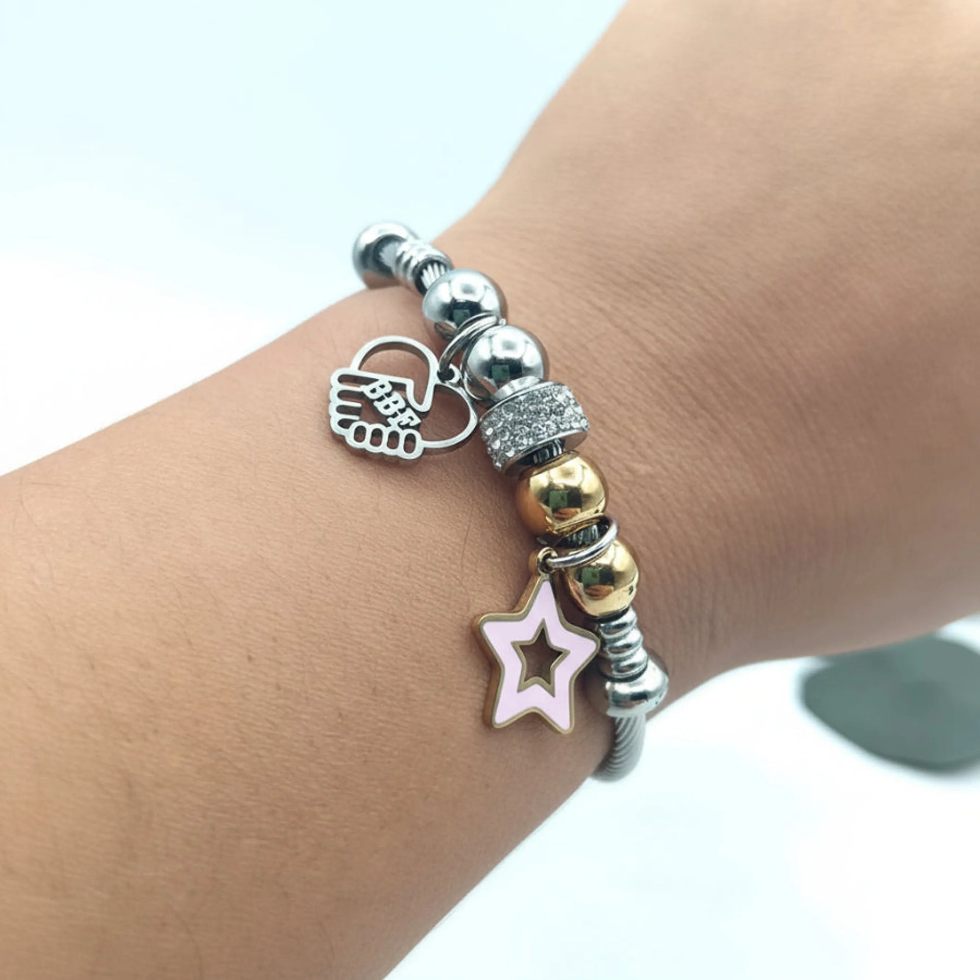 Pulsera de acero inoxidable con colgantes de estrella y corazón – De moi à toi