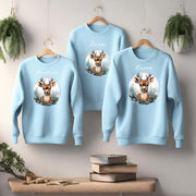  sudadera azul con ciervos navideños – De moi à toi  